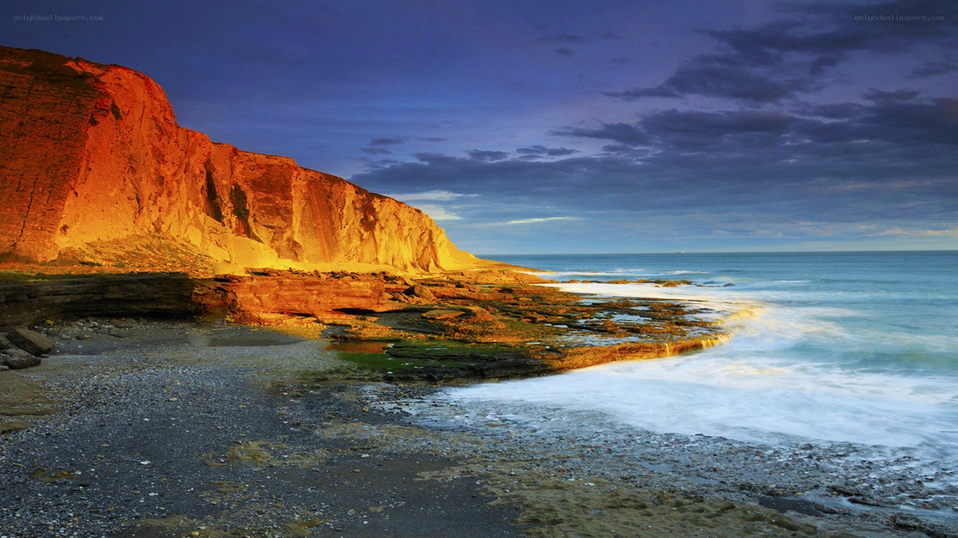 Cliffs at sunset by the sea