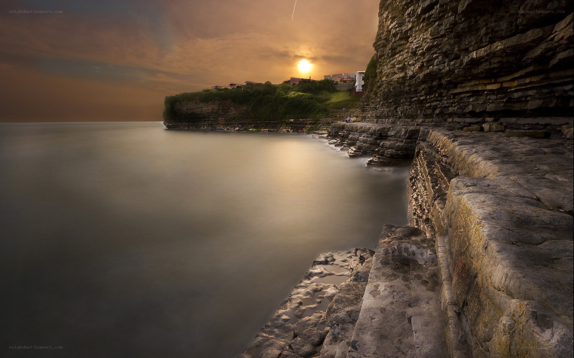 Cliffs at sunset by the sea