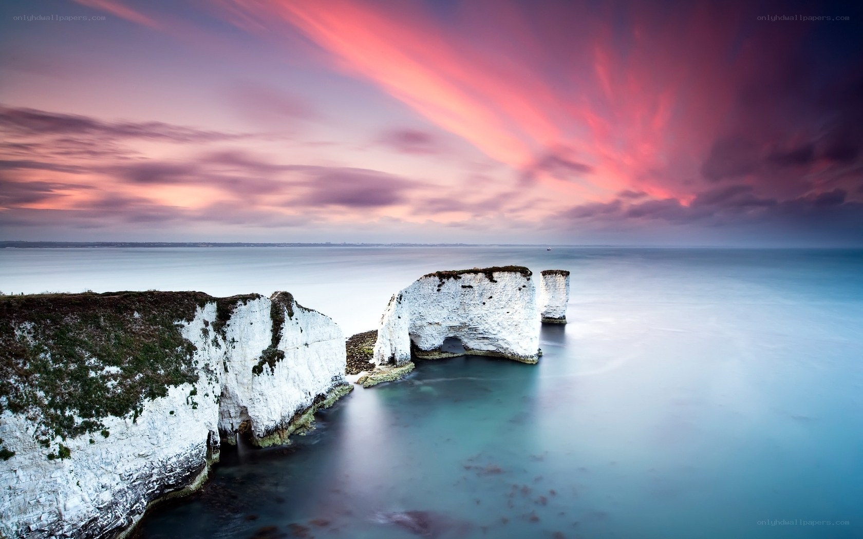 Cliffs at sunset by the sea