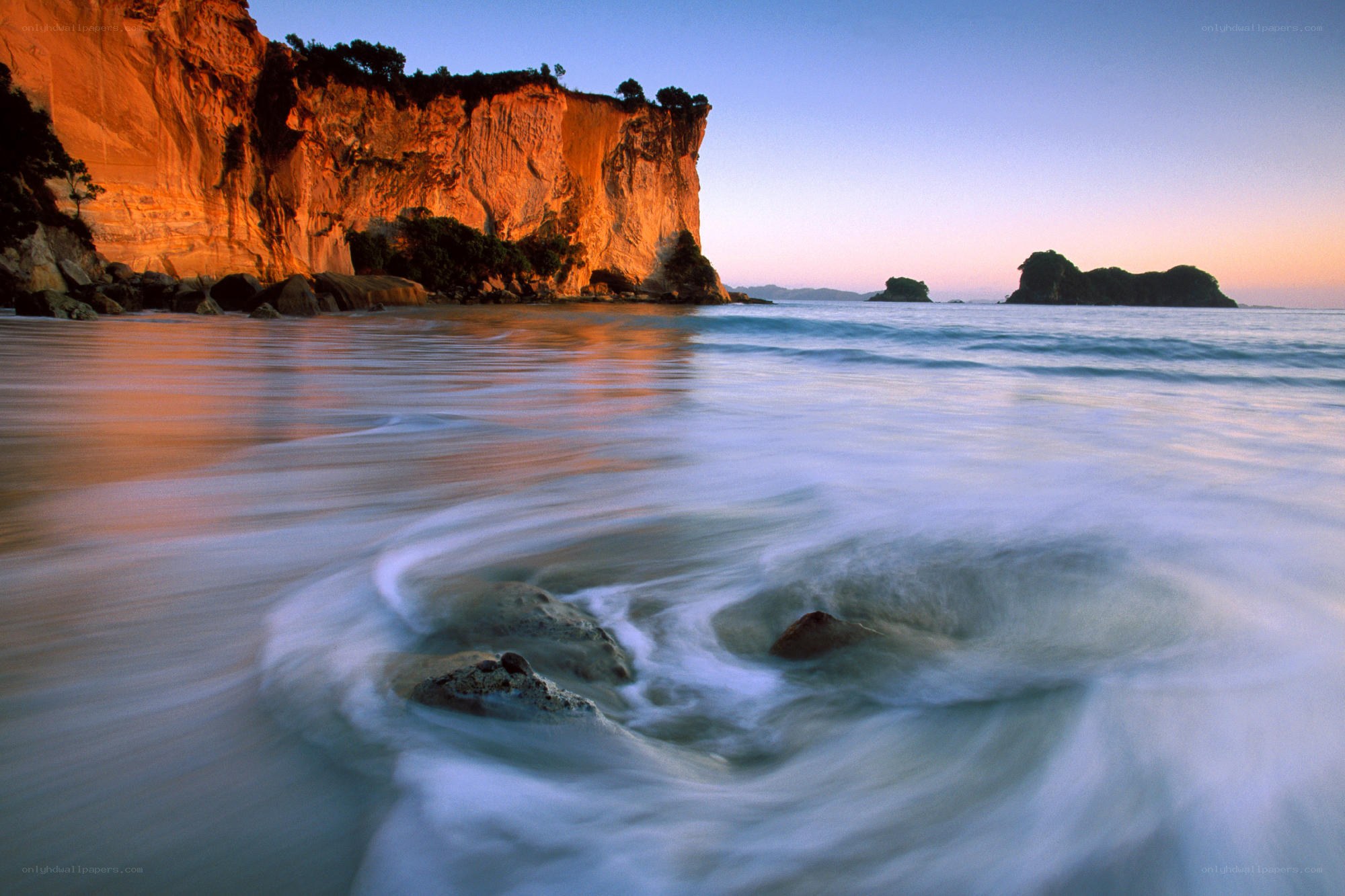 Cliffs at sunset by the sea