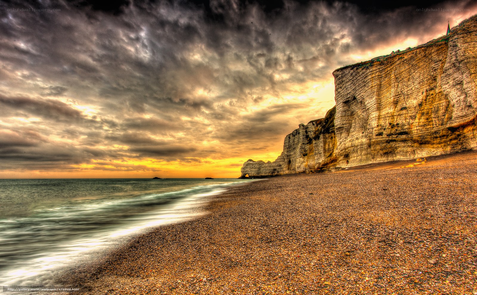 Cliffs at sunset by the sea
