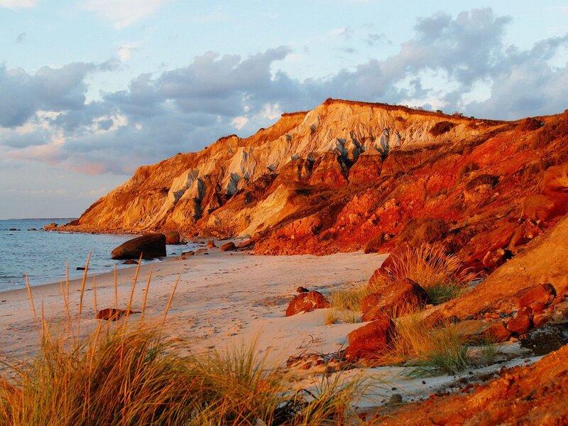 Cliffs at sunset on a sandy beach