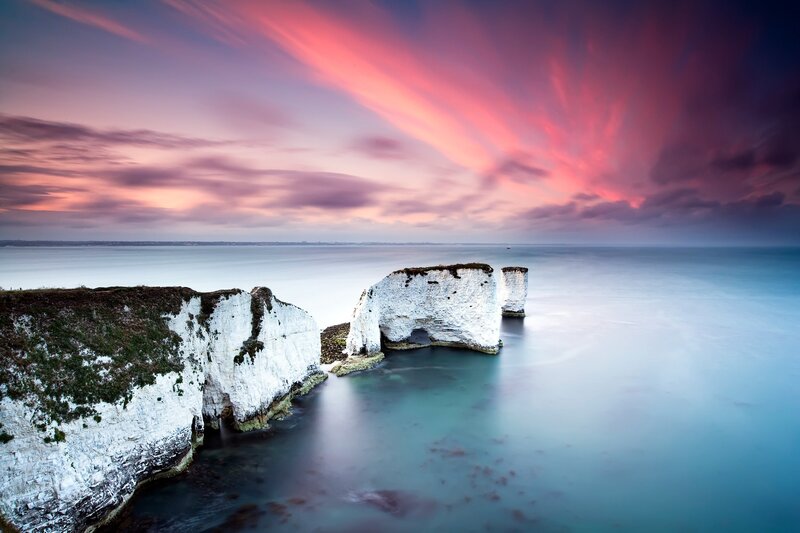 Cliffs at sunset with pink sky