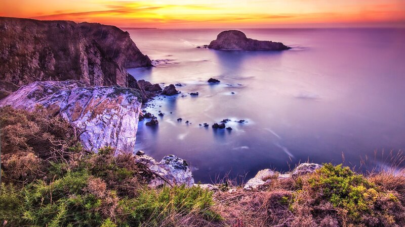 Cliffs at sunset with sea
