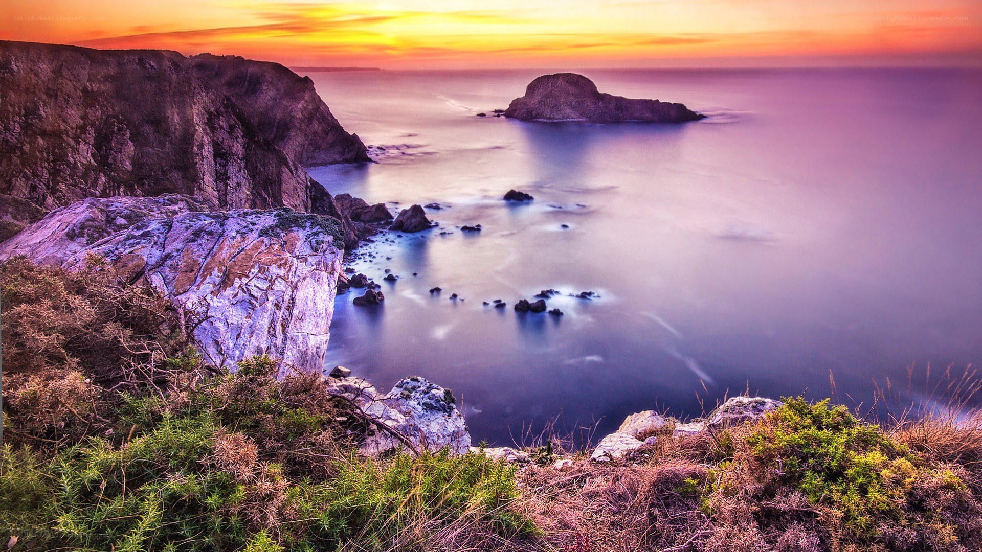 Cliffs at sunset with sea