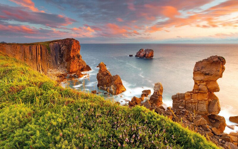 Cliffs at sunset with sea stacks