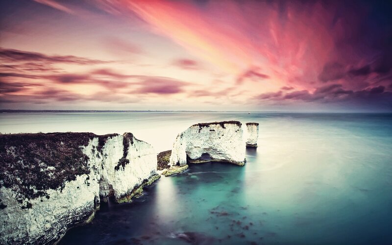 Cliffs at sunset with vibrant sky