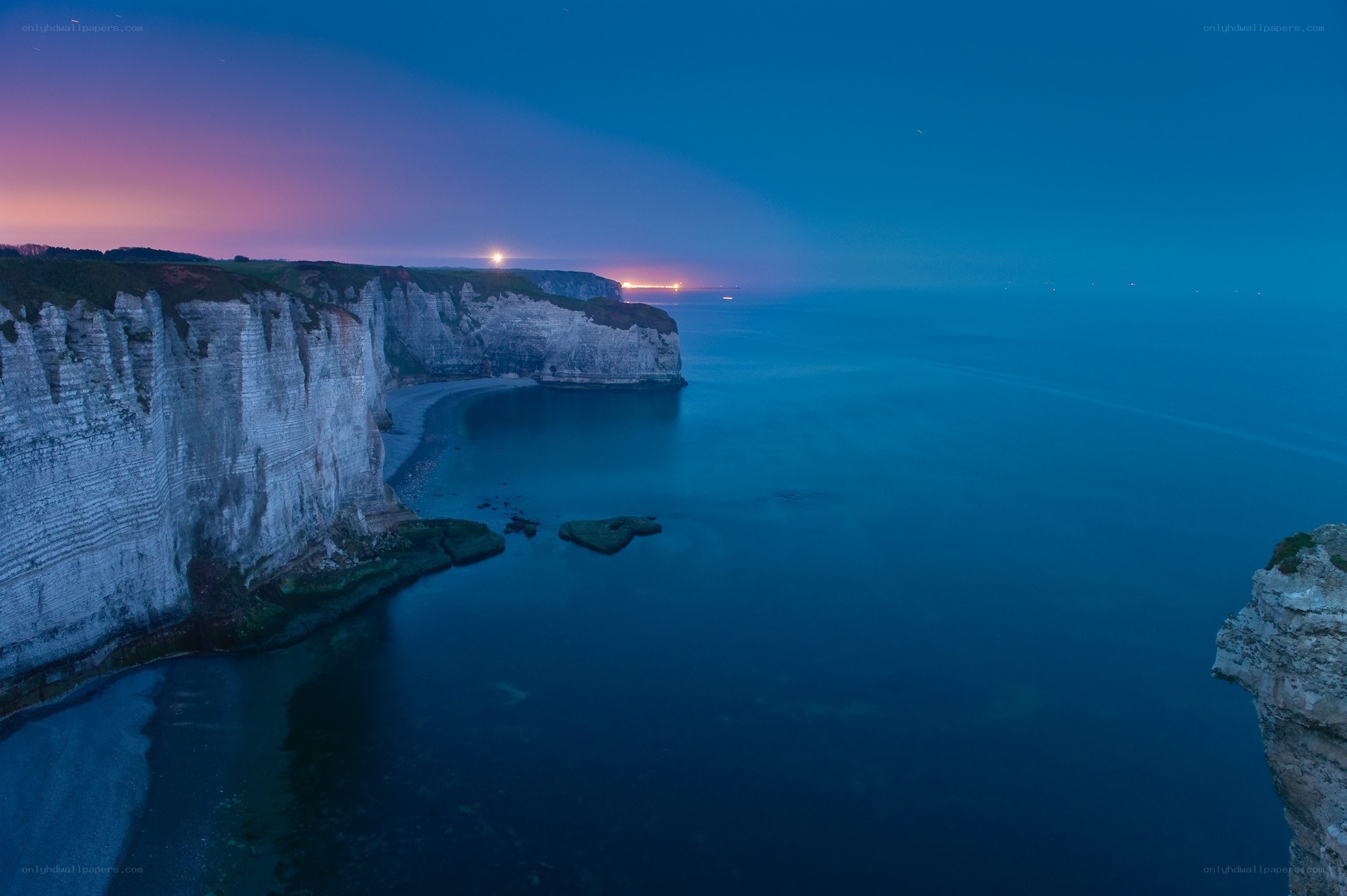 cliffs at twilight by the sea