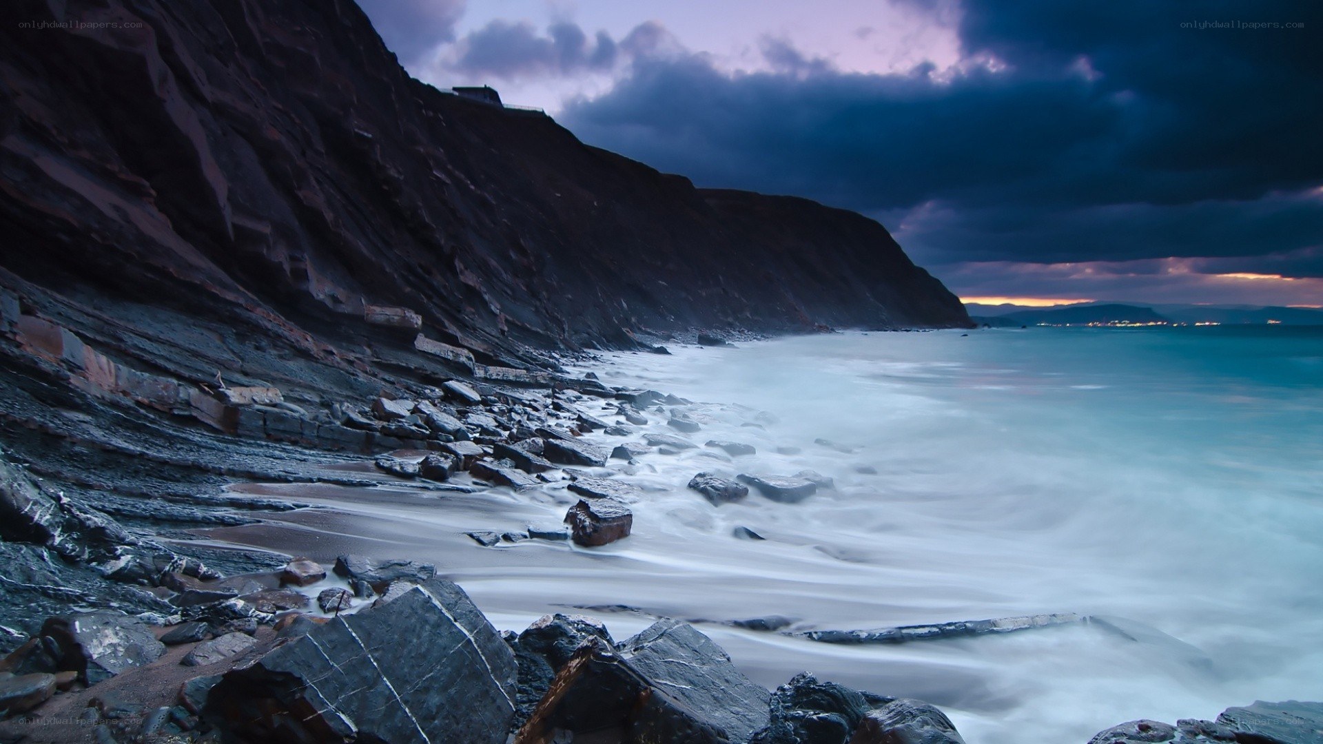 Cliffs at twilight by the sea
