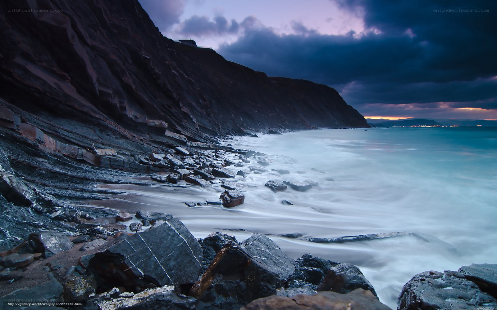 Cliffs at twilight by the sea