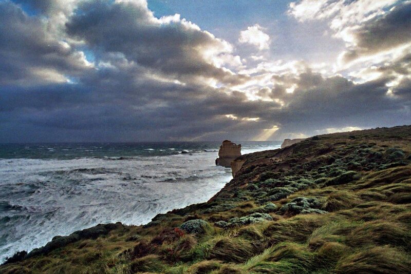 Cliffs by the ocean at sunset