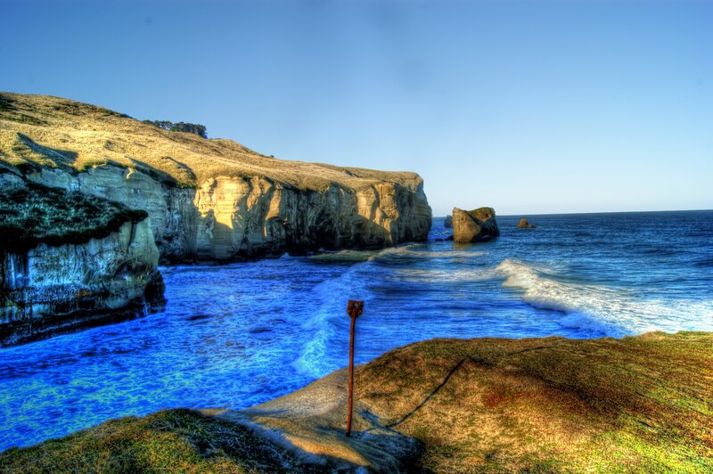 Cliffs by the Ocean — Blue, Dramatic, Afternoon, Photograph, Rock Formations