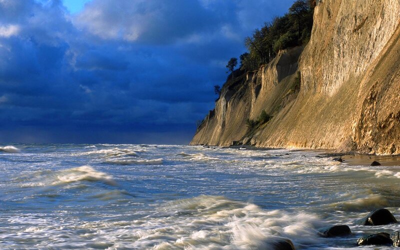 Cliffs by the sea at sunset
