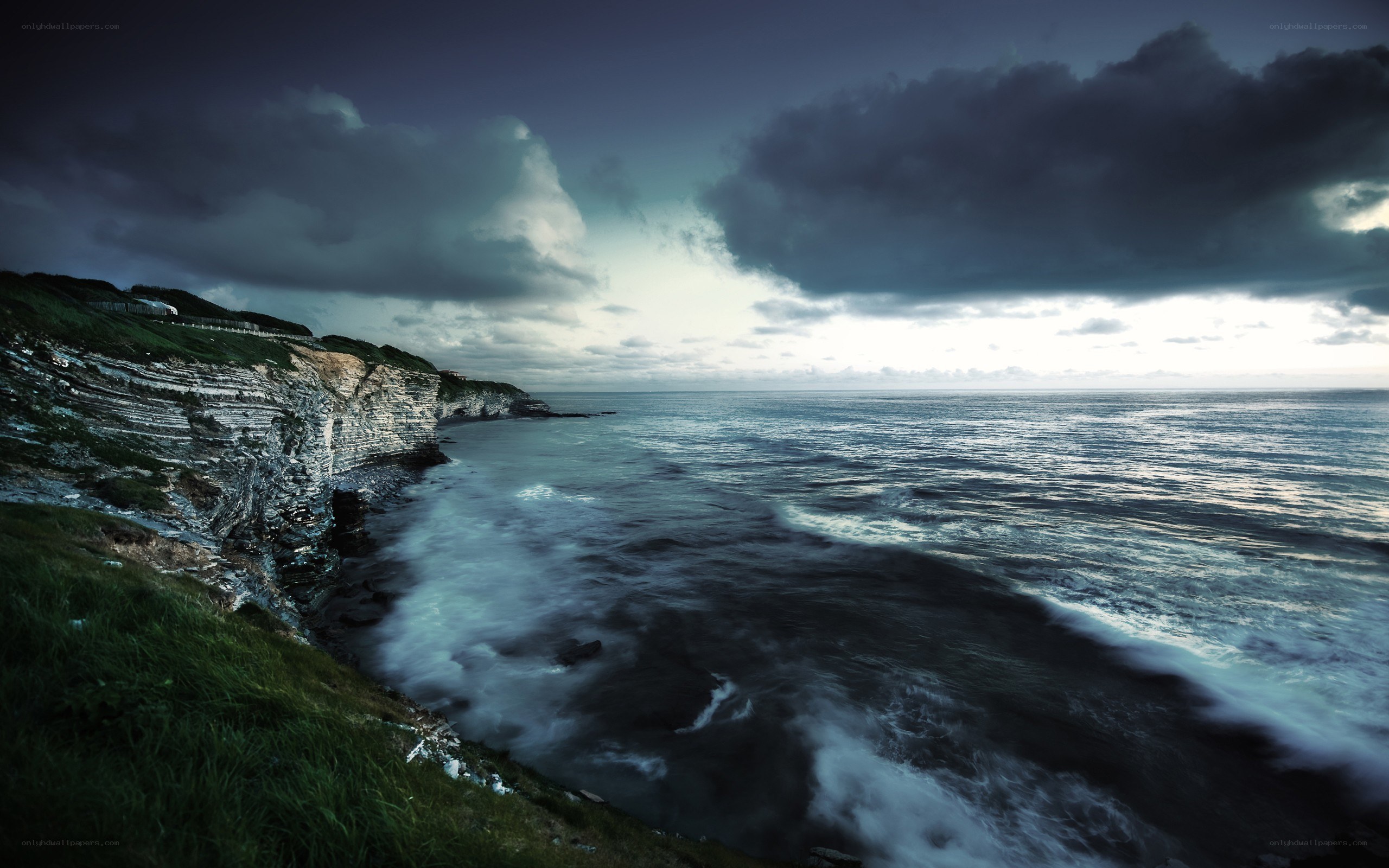 Cliffs by the stormy sea