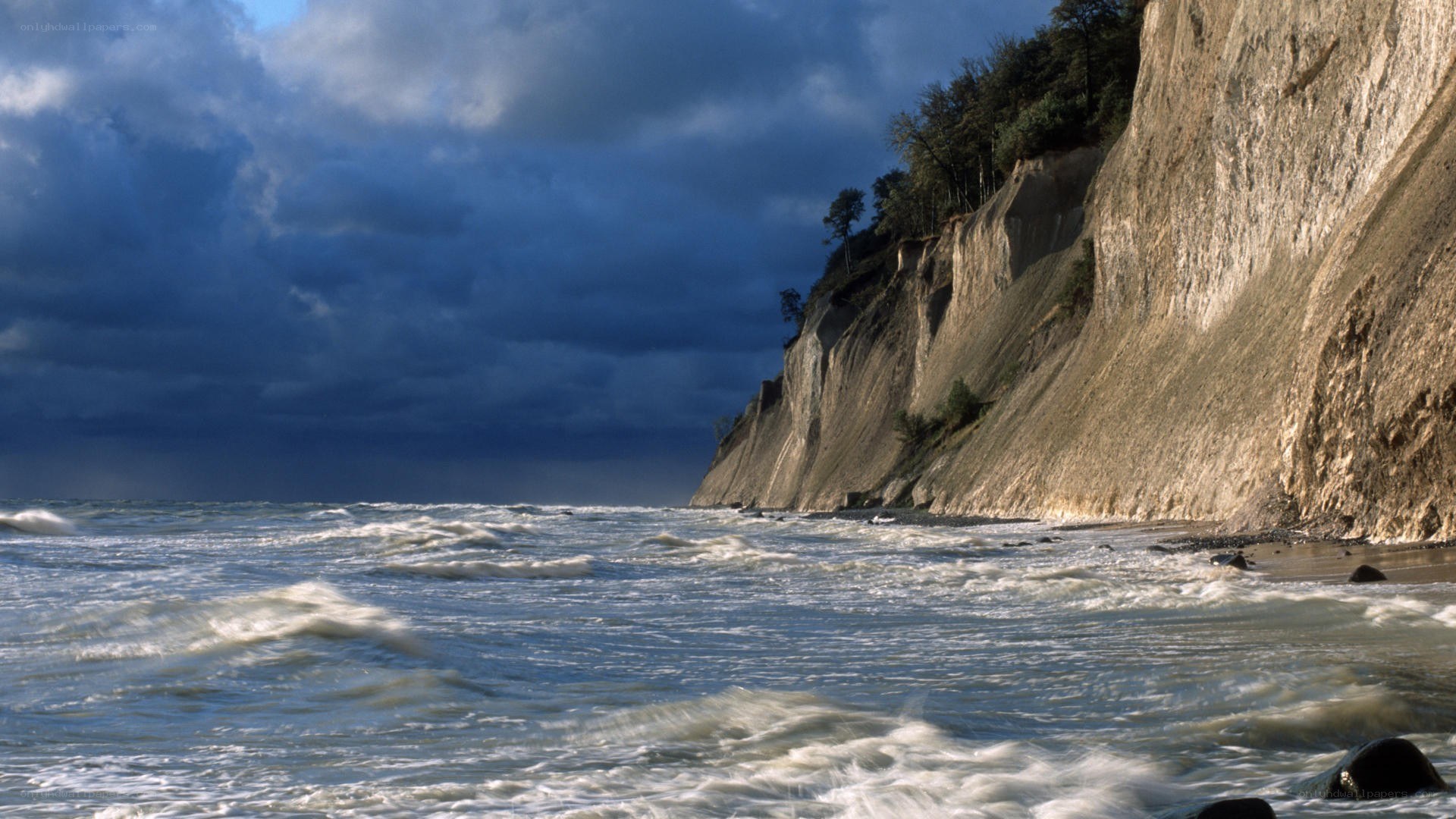 Cliffs by the stormy sea