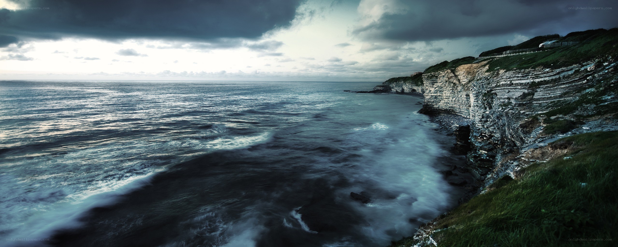Cliffs by the stormy sea