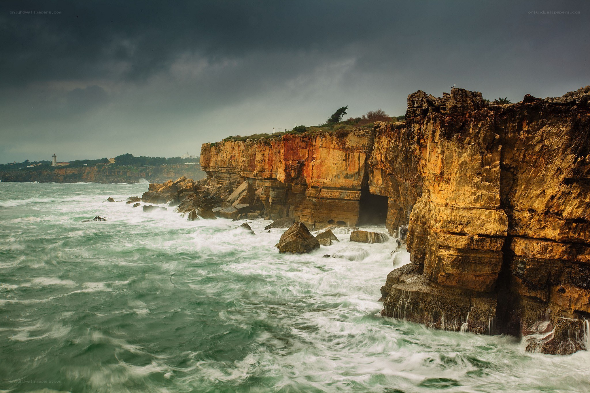 Cliffs by the stormy sea