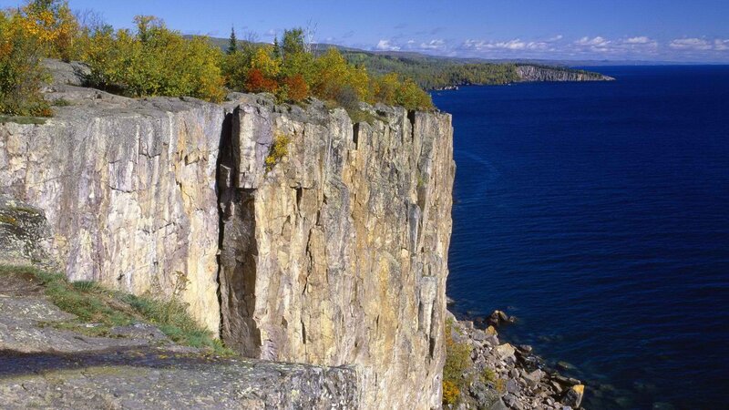 Cliffs overlooking a blue lake