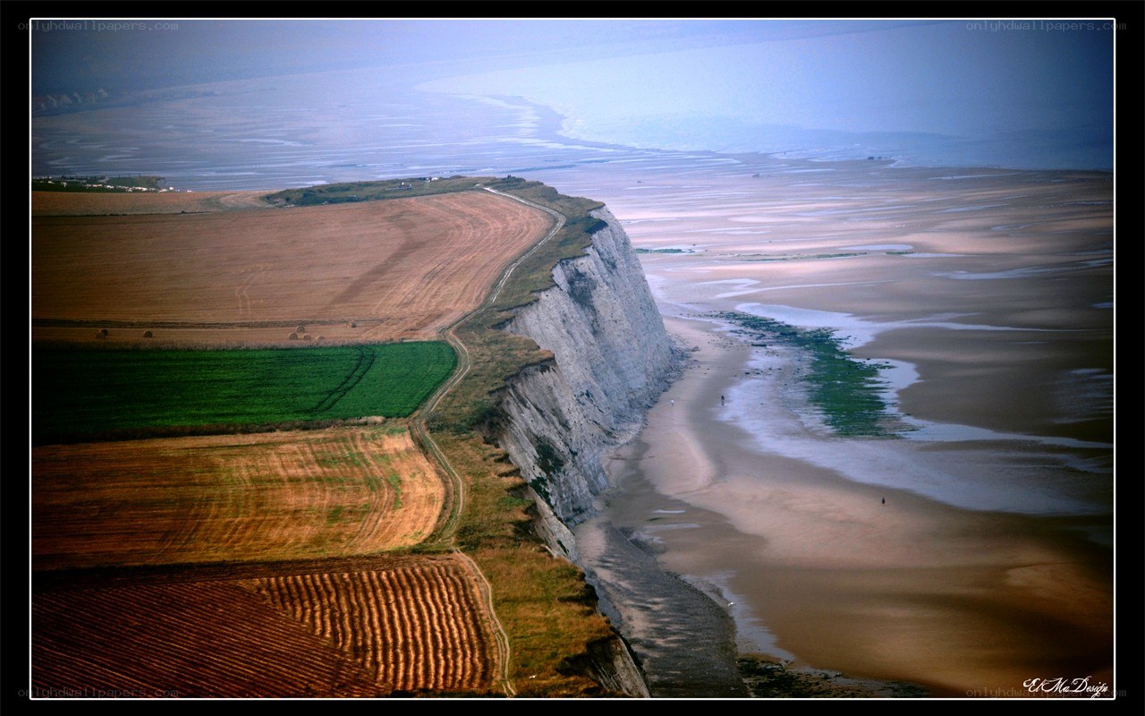cliffs overlooking a coastal plain