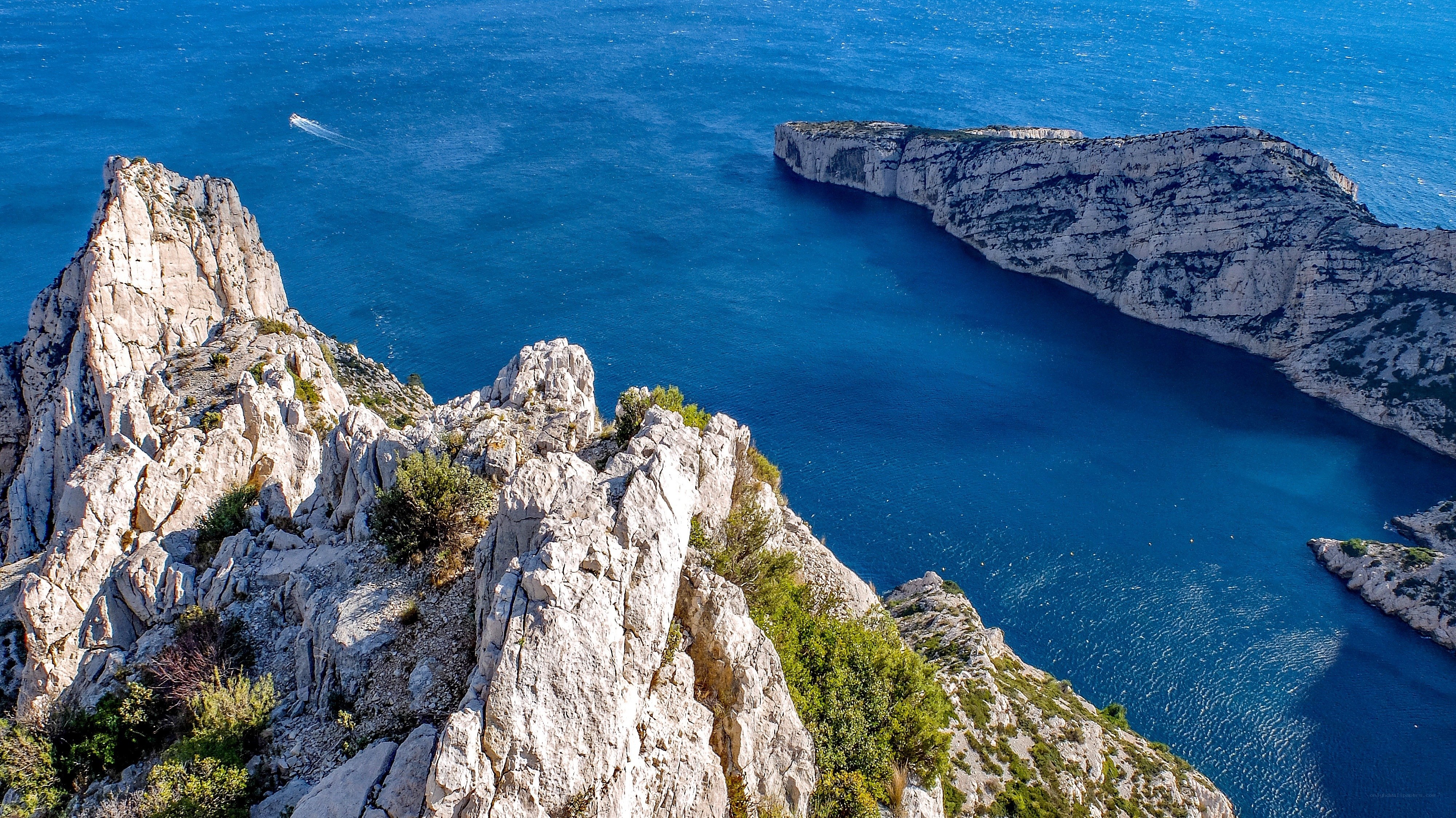 Cliffs overlooking blue sea