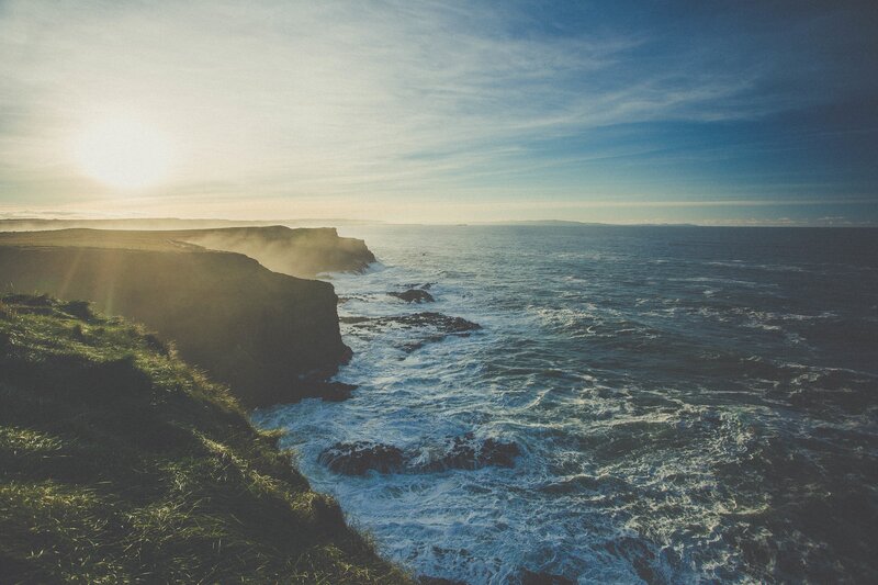 Cliffs Overlooking Ocean — Blue, Dramatic, Sunset, Photograph