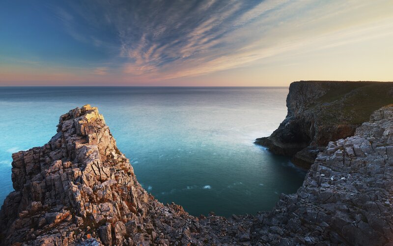 Cliffs overlooking the sea at sunset