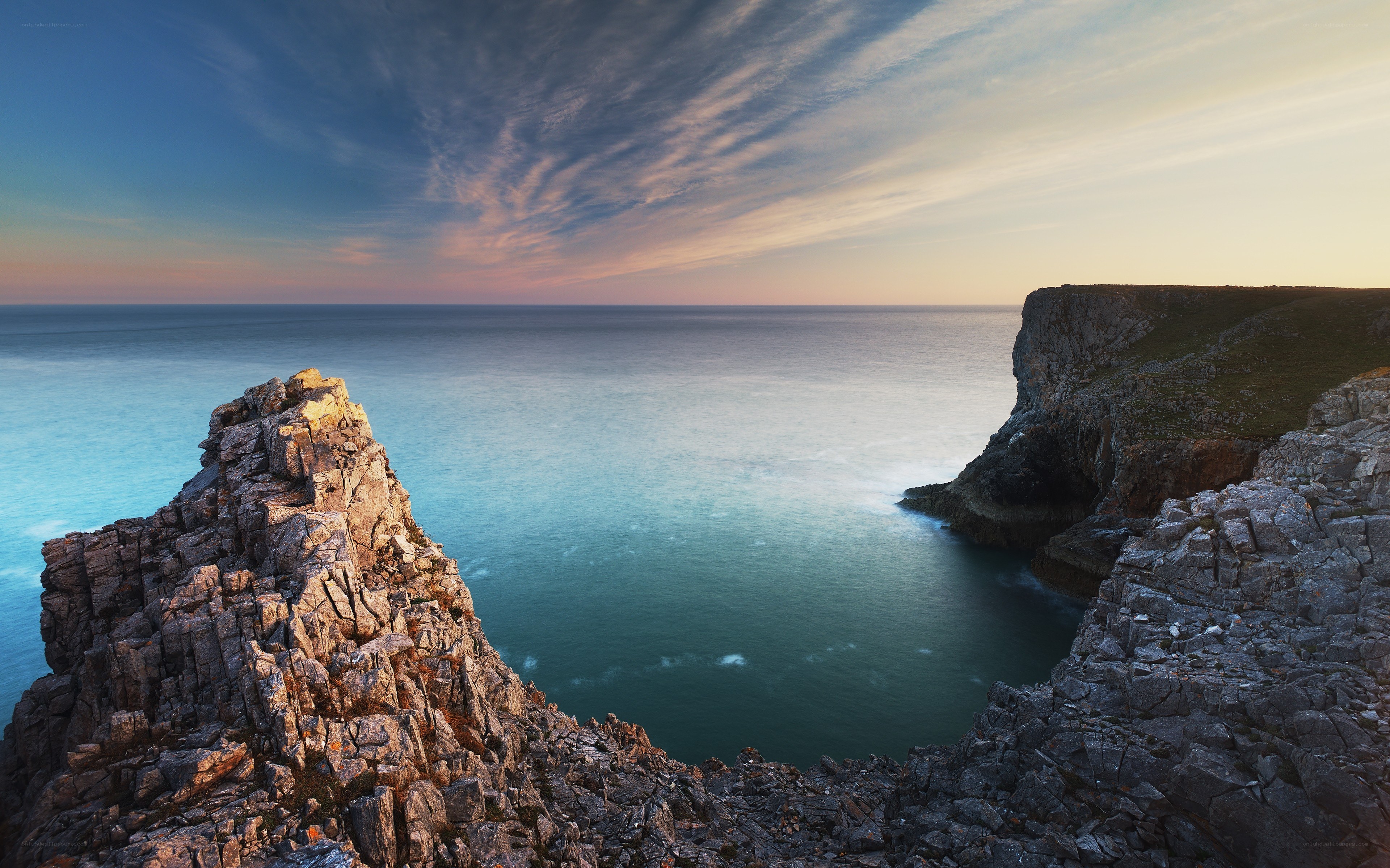 Cliffs overlooking the sea at sunset