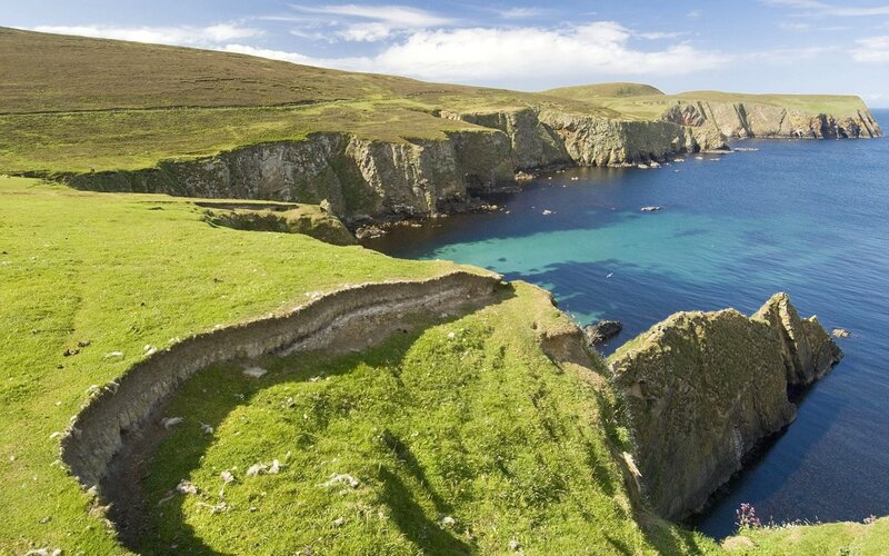 cliffs overlooking turquoise sea