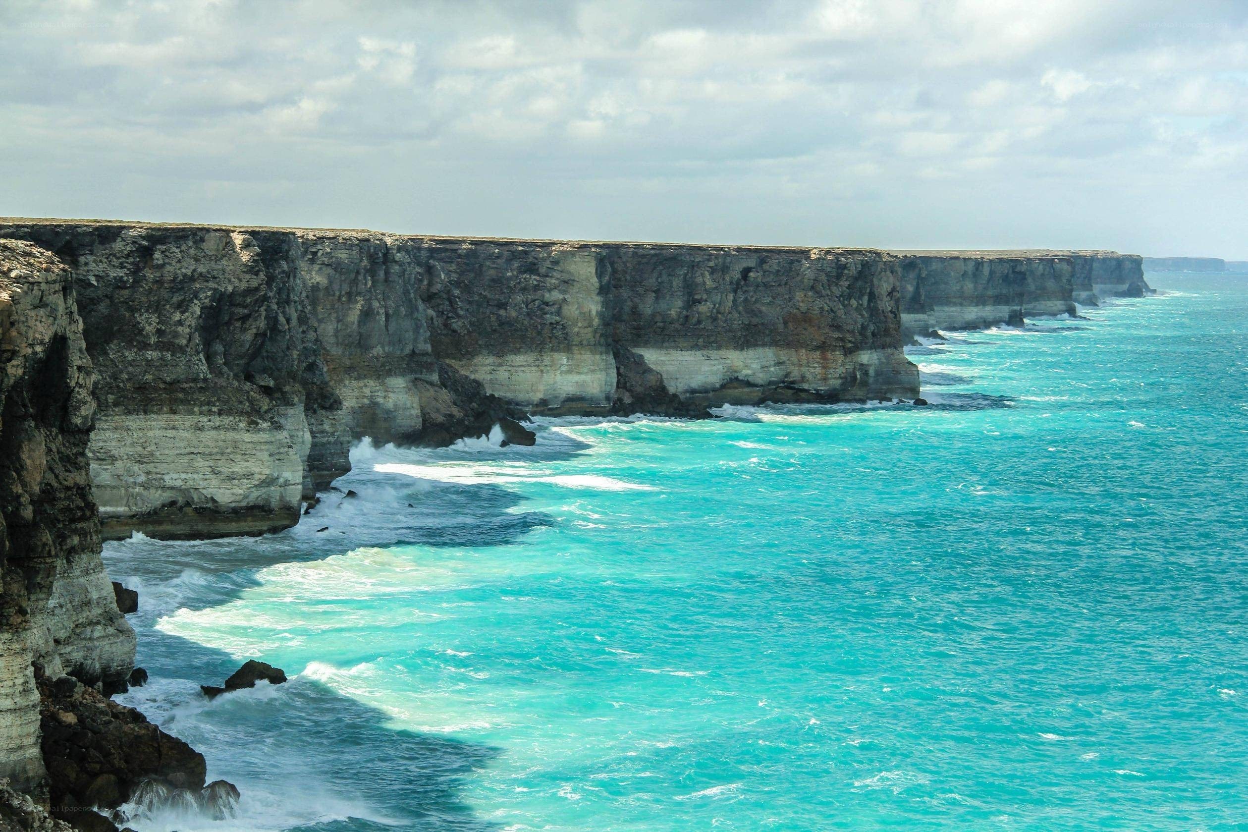 cliffs overlooking turquoise sea