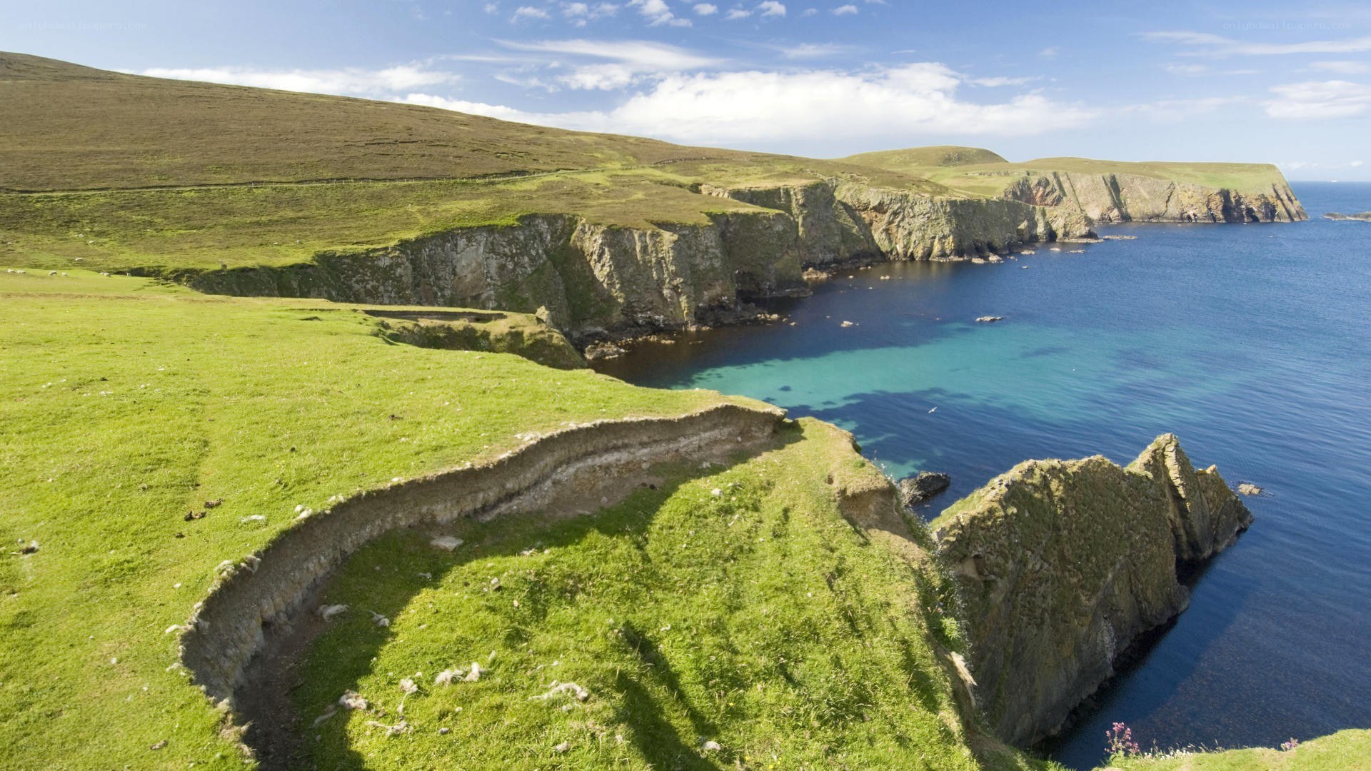 cliffs overlooking turquoise sea
