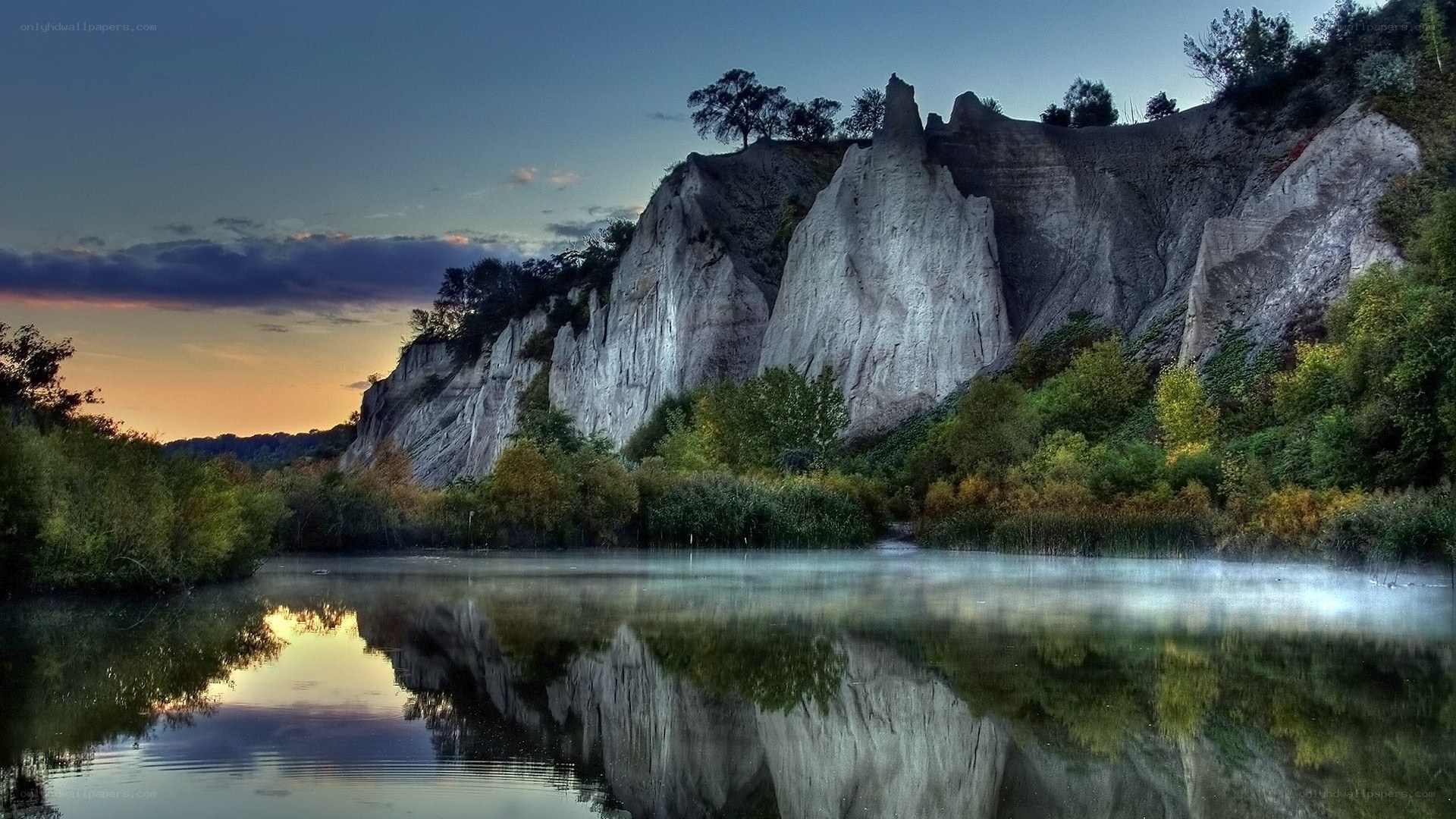 Cliffs reflected in a calm lake