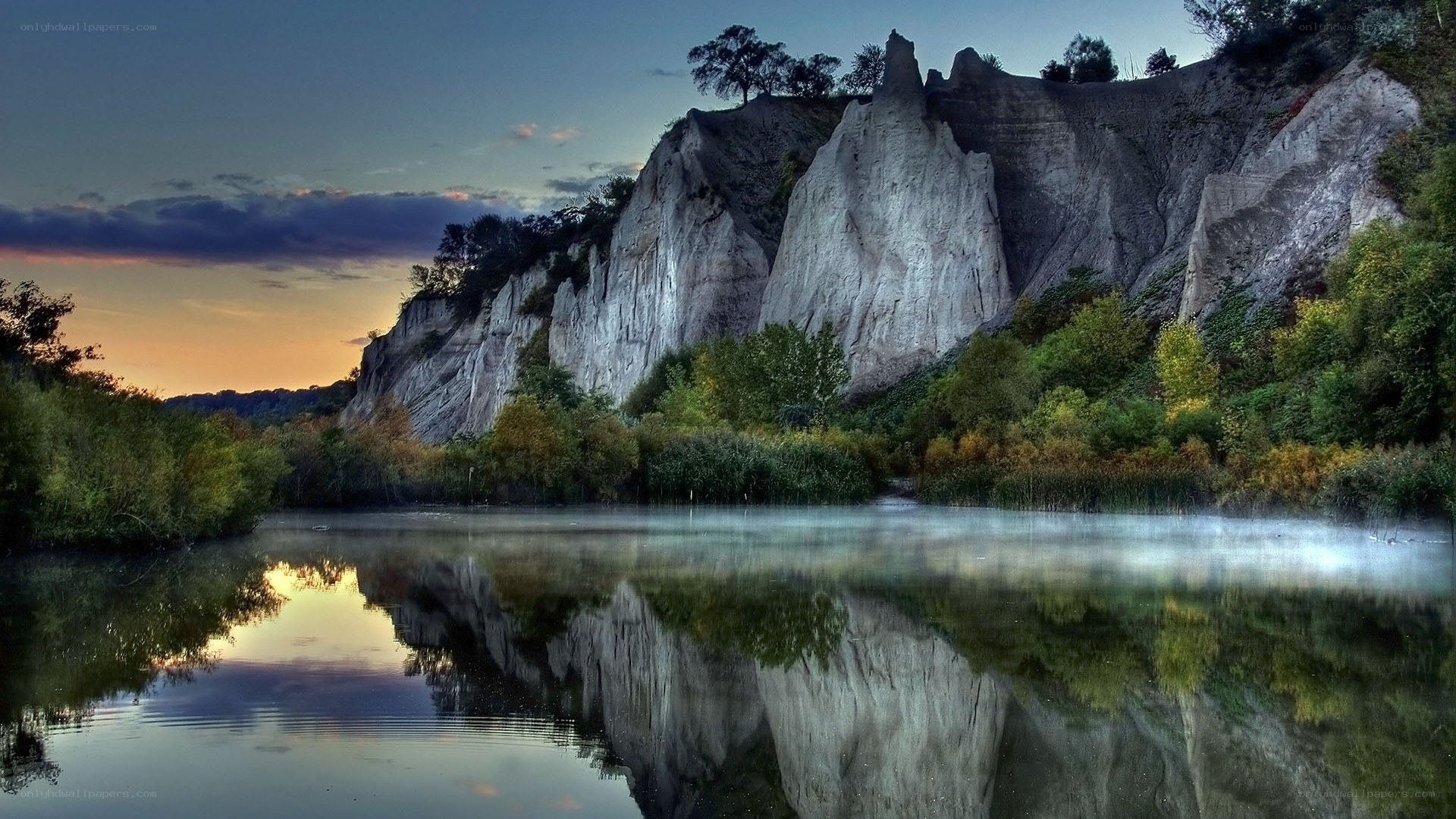 Cliffs reflected in a calm lake