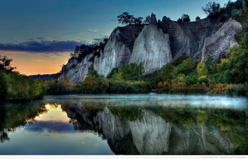 Cliffs reflected in a calm lake