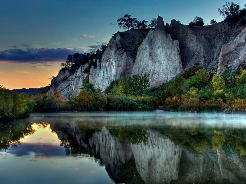Cliffs reflected in a calm lake