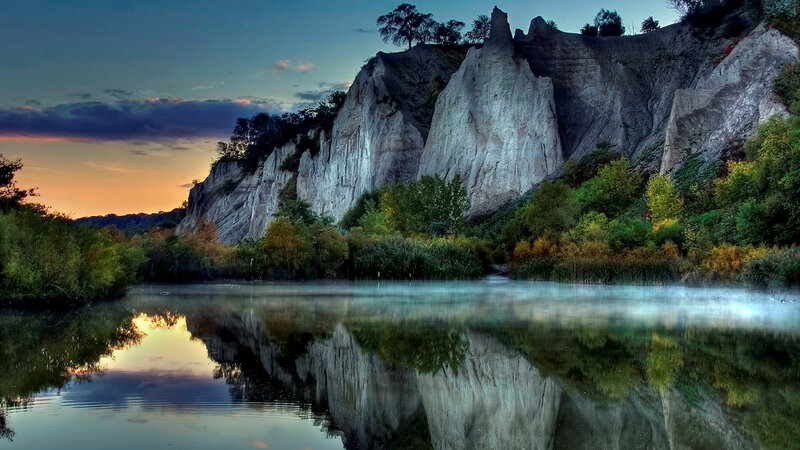 Cliffs reflected in a calm lake