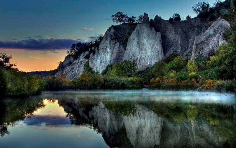 Cliffs Reflected in Lake — Blue, Serene, Sunset, Photograph