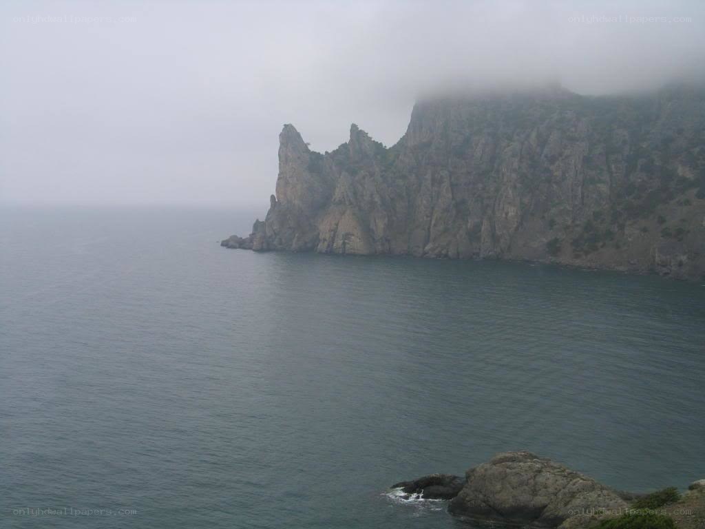 cliffs shrouded in fog