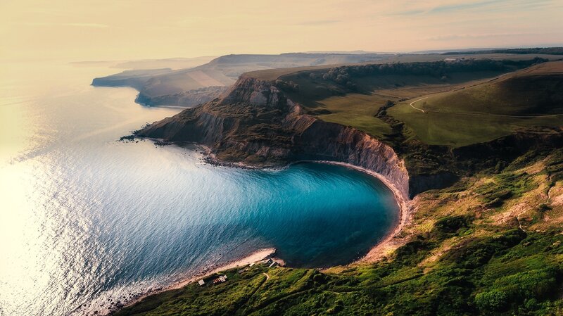 Cliffside Bay at Sunset — Blue, Serene