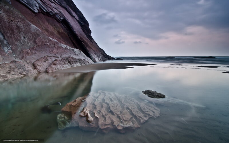 Cliffside beach at dusk