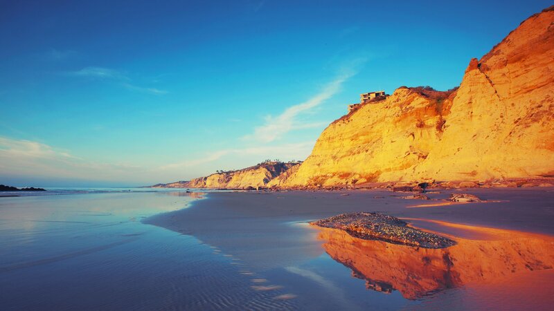 Cliffside beach at sunset