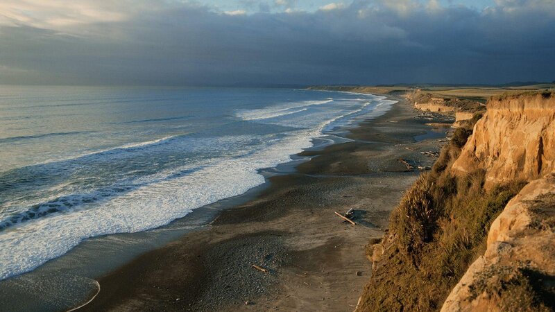 Cliffside Beach at Sunset — Blue, Dramatic, Photograph