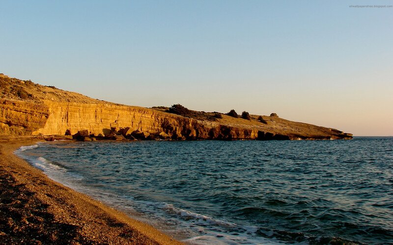 Cliffside Beach at Sunset — Blue, Serene, Photograph, Ocean, Cliffs
