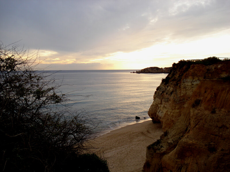 Cliffside Beach at Sunset — Blue, Serene, Photograph, Ocean, Sand, Trees