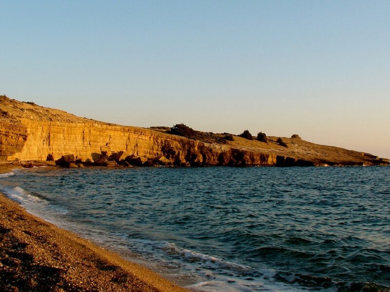 Cliffside Beach at Sunset — Blue, Serene, Photograph, Sea