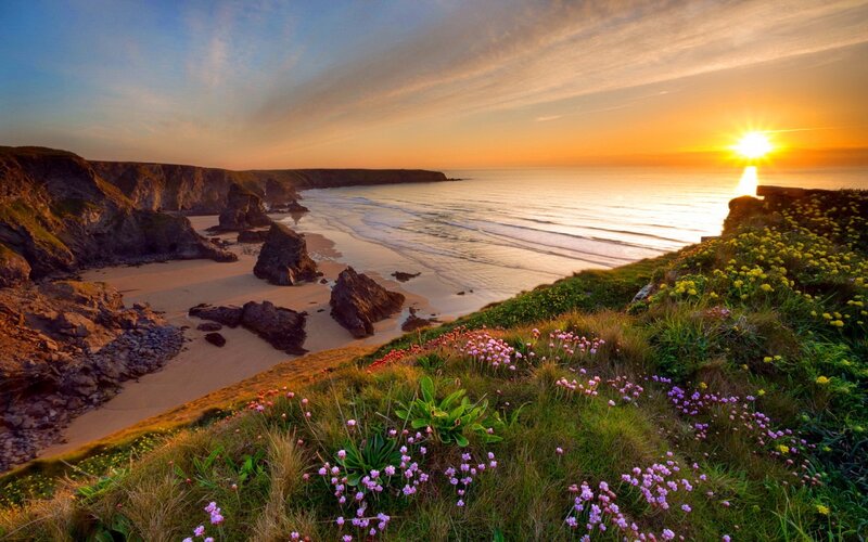 Cliffside Beach at Sunset — Orange, Serene, Photograph, Ocean, Rocks
