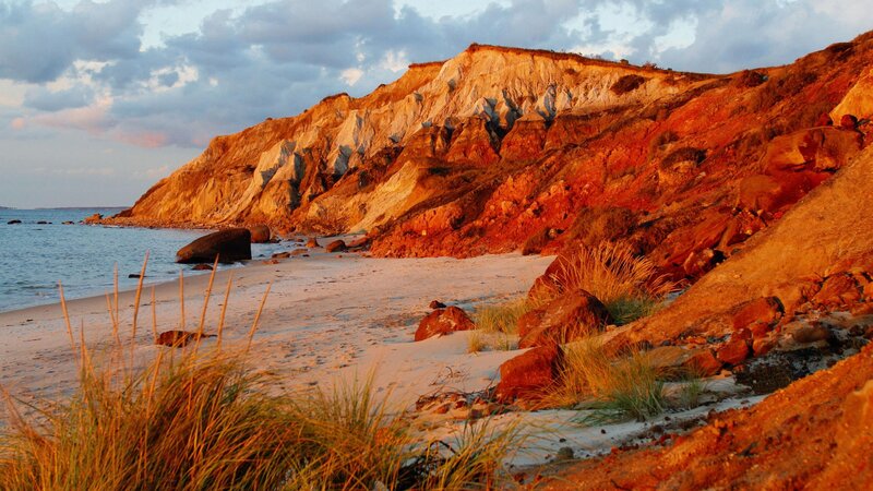 Cliffside Beach at Sunset — Orange, Serene, Photograph, Sand, Rocks