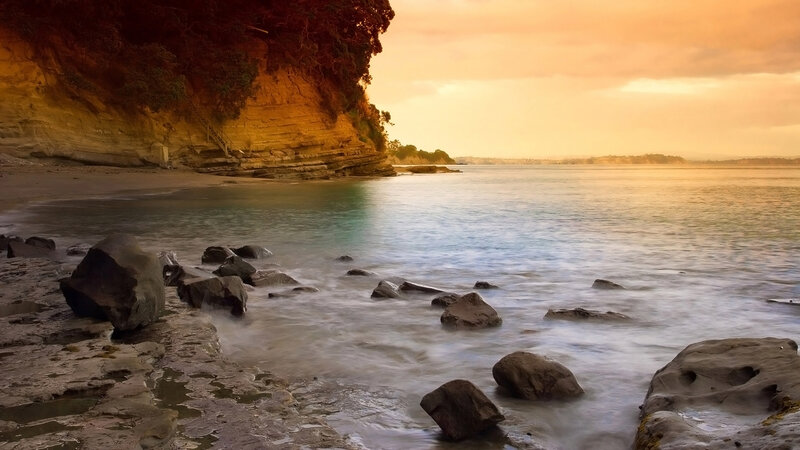 Cliffside Beach at Sunset — Orange, Serene
