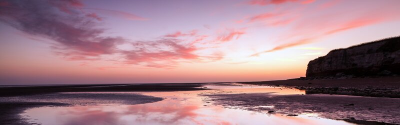 Cliffside Beach at Sunset — Pink, Serene