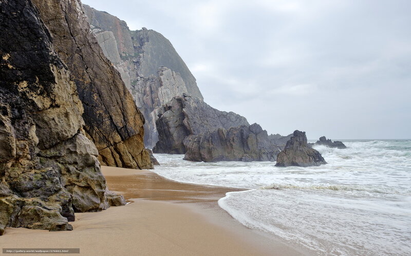 cliffside beach with crashing waves
