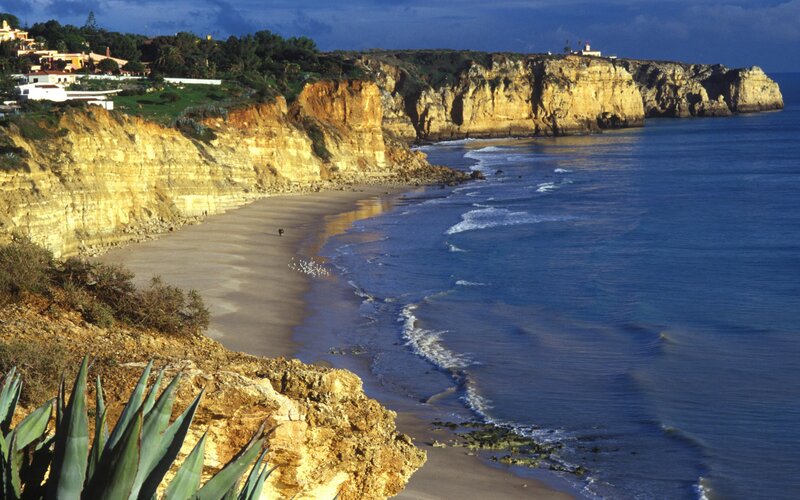 Cliffside Beach with Lighthouse — Blue